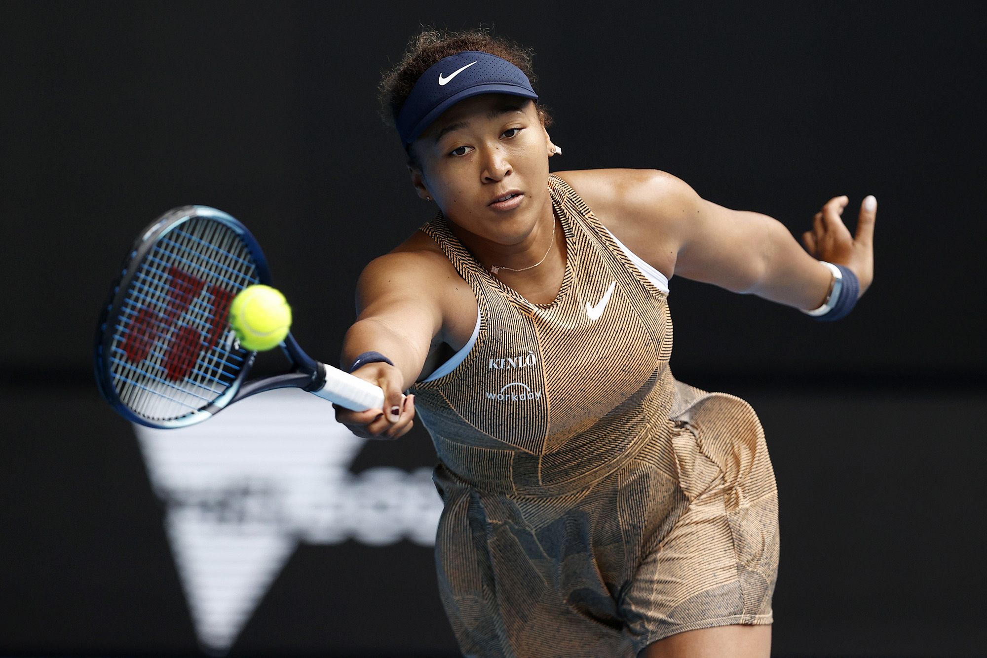 Naomi Osaka playing tennis